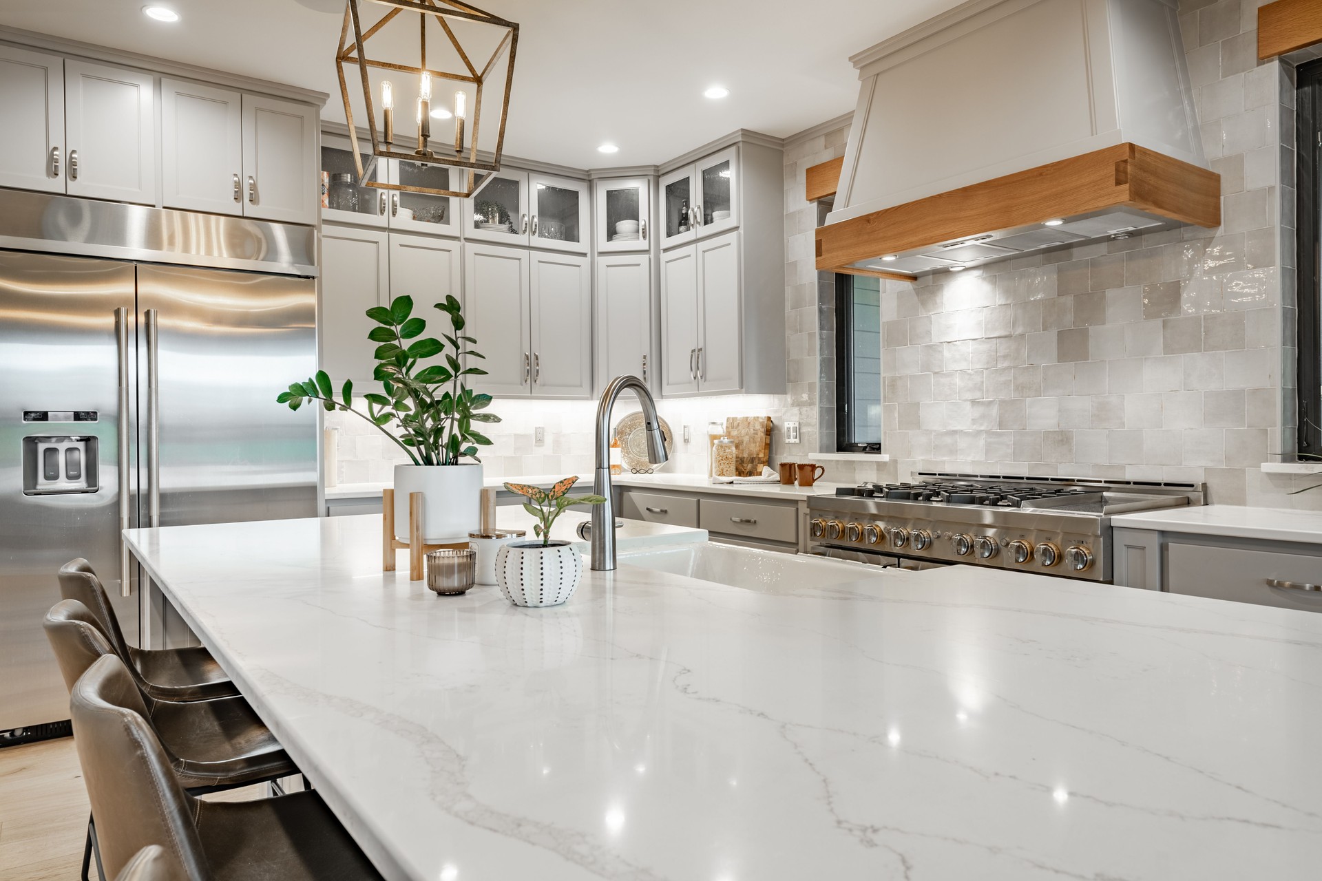 Beautifully renovated kitchen featuring custom cabinets, modern countertops, and elegant lighting, designed and crafted by NobleStar General Contractor Ottawa